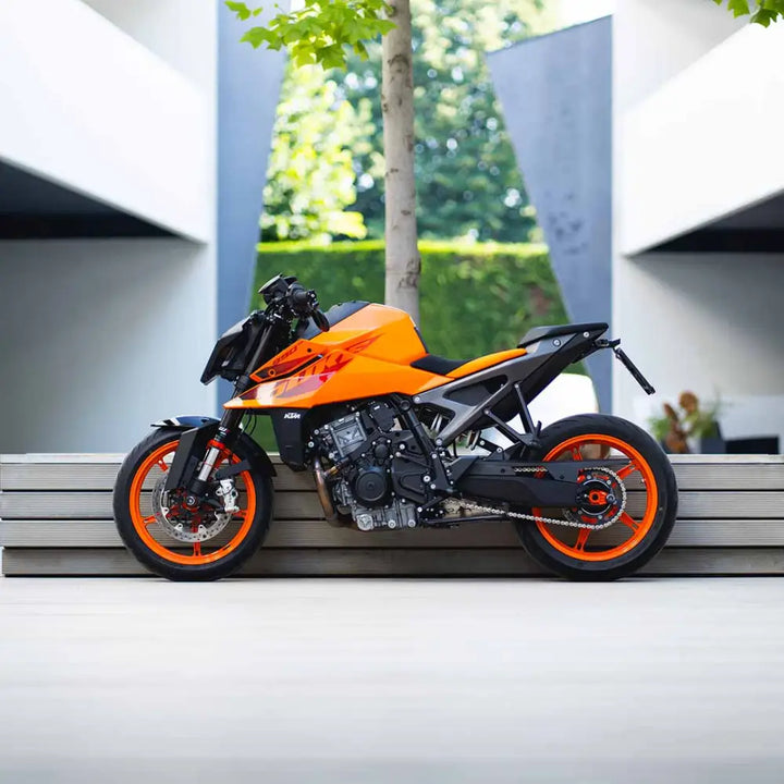 Sleek orange and black KTM Duke motorcycle showcasing Bagoros Halespoiler and plug and play design