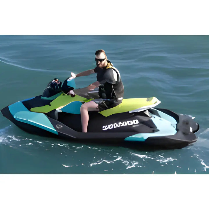 Person riding a Sea-Doo on blue water with Base AUDIO KIT SPARK installed