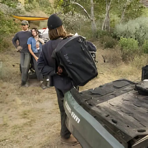 Kayak being loaded with gear and equipment using LINQ 40 L Urban Bag