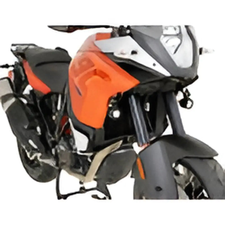 Sporty orange and black motorcycle with Denali Ekstralysbrakett for KTM 1090 Adventure