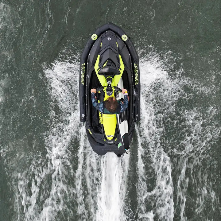 Vibrant yellow and black sea-doo rxt-x personal watercraft featuring ride engine base pwc collar plus speeding across the water