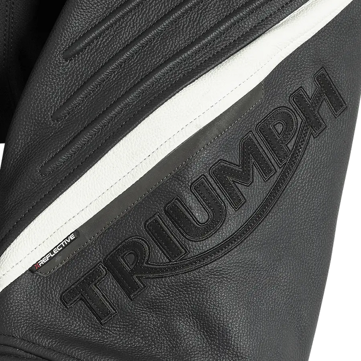 Svart lærermotorsykkeljakke med hvite striper og embossede Triumph-logoen